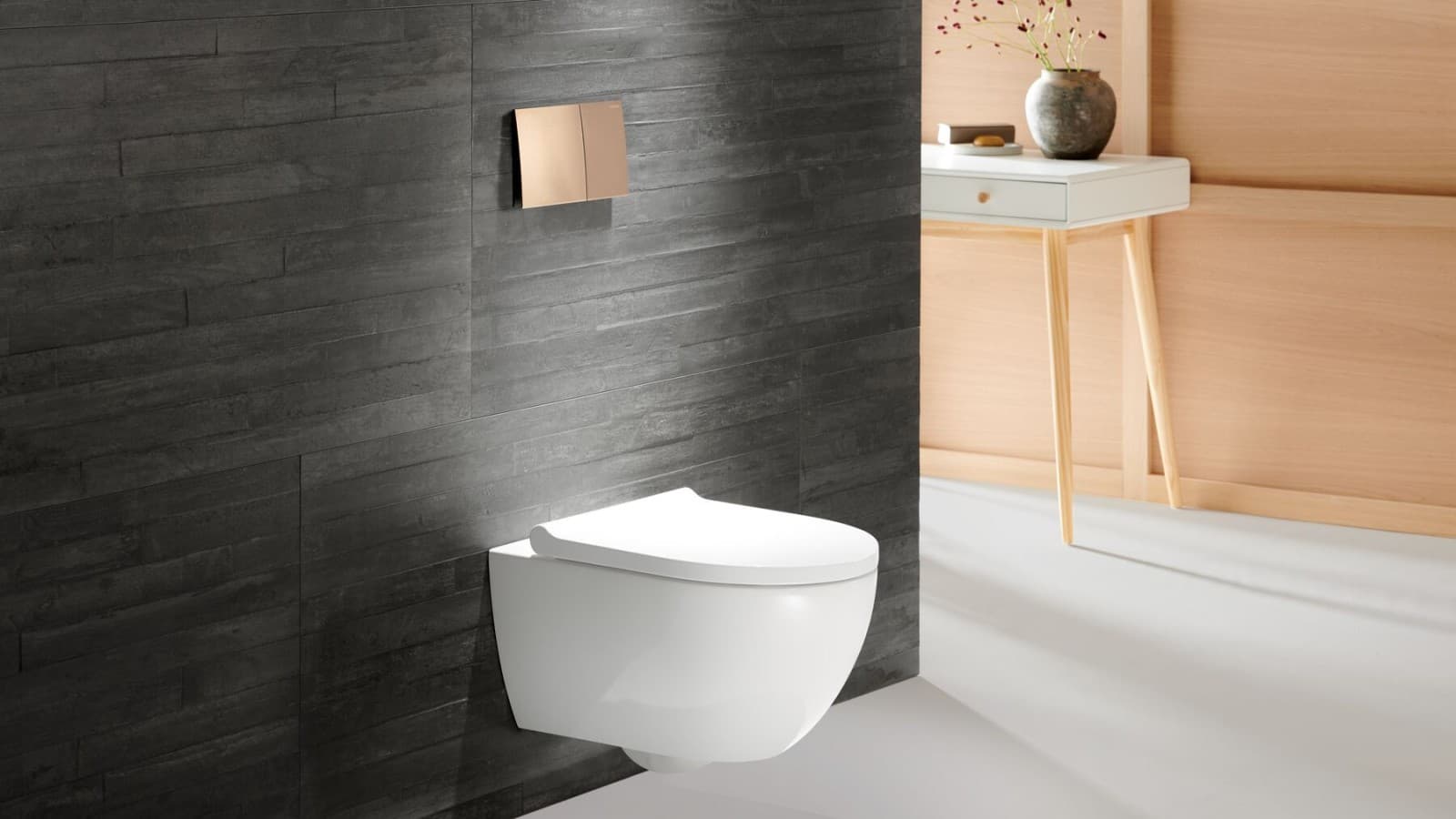 Geberit Acanto WC mit Geberit Betätigungsplatte Sigma70 in Rosegold Geberit Acanto WC mit Geberit Betätigungsplatte Sigma70 in Rosegold